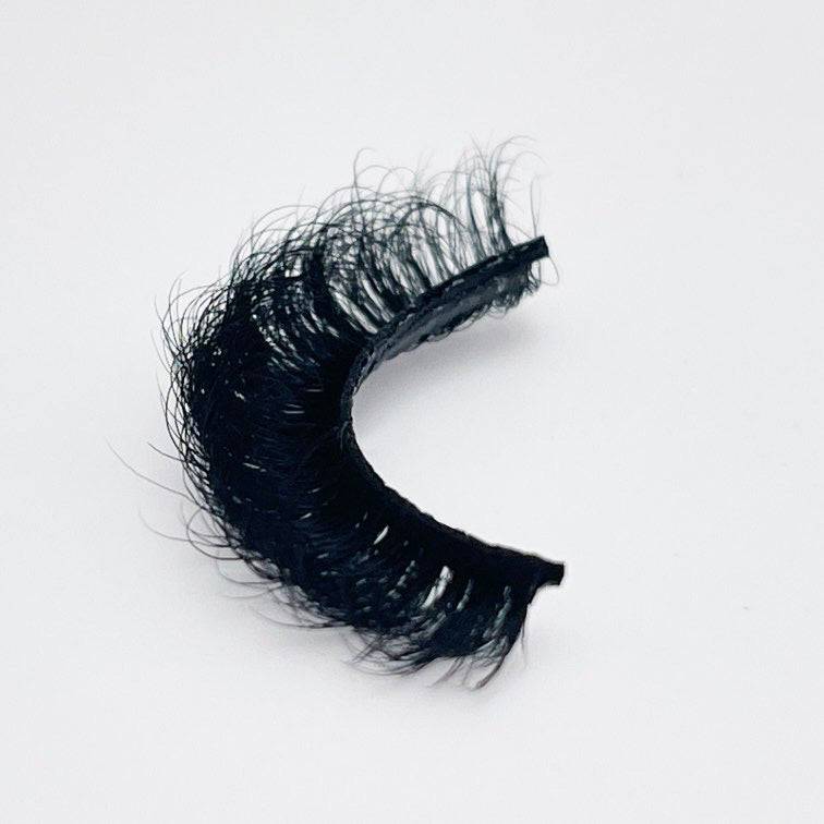 Fluffy mink strip eyelashes by Aris featuring a voluminous and lightweight design, perfect for enhancing eye makeup. Free shipping on orders over $40.