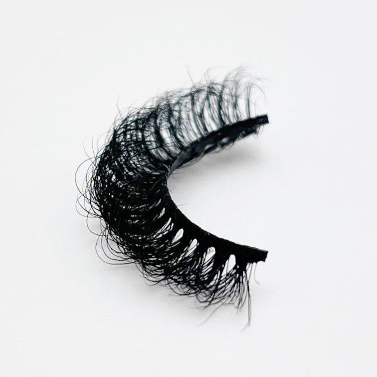 Premium mink strip eyelashes in a natural black shade, offering a lightweight and durable design for comfortable wear. Perfect for enhancing eye makeup looks.